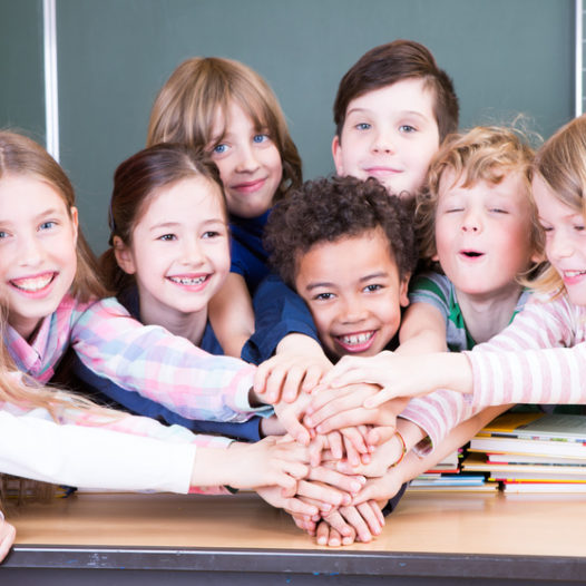 Hnde aufeinander Freude in der Schule