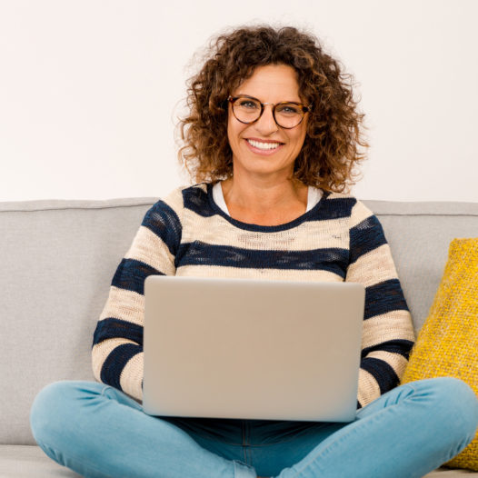 Beautiful woman working at home